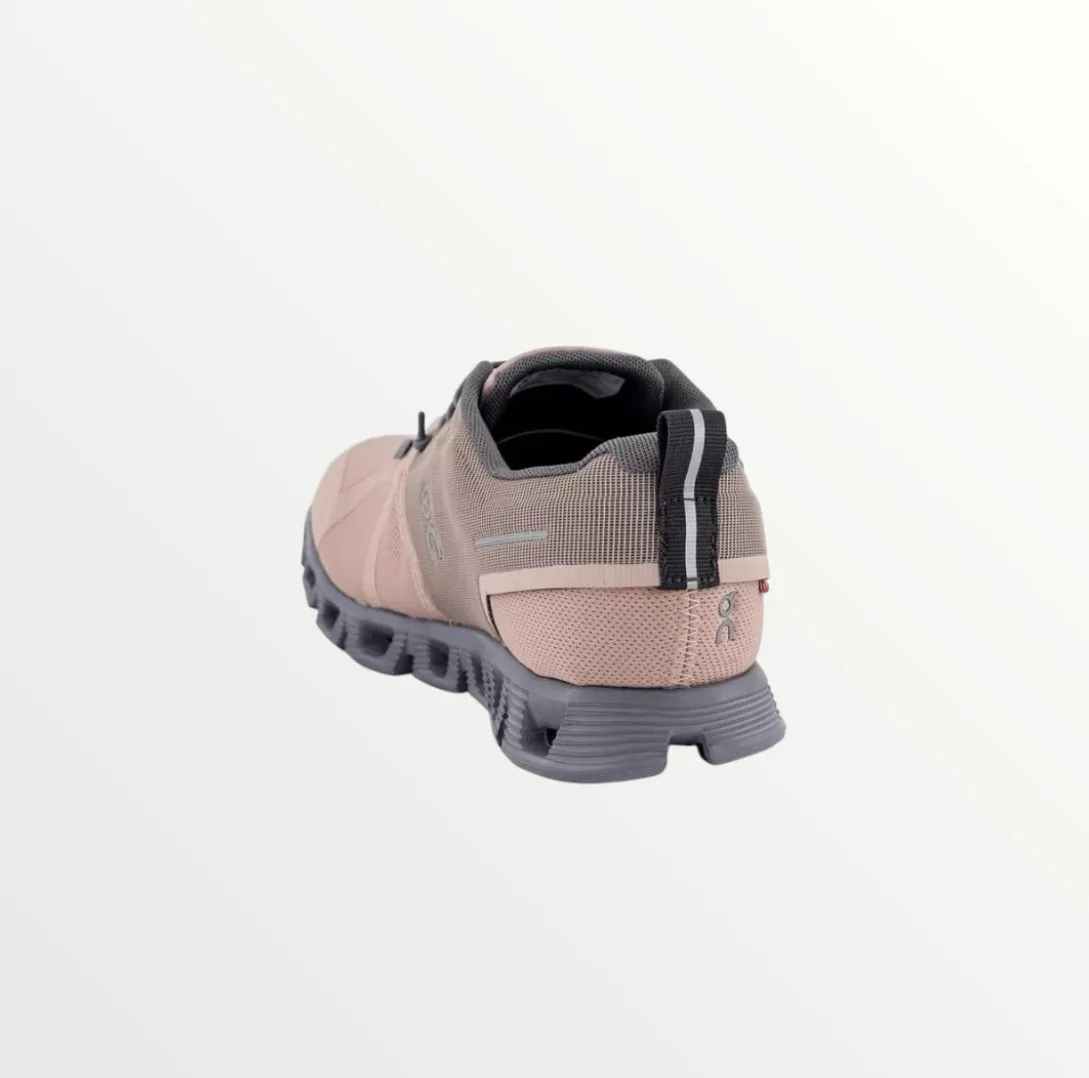 on cloud in pink sneaker