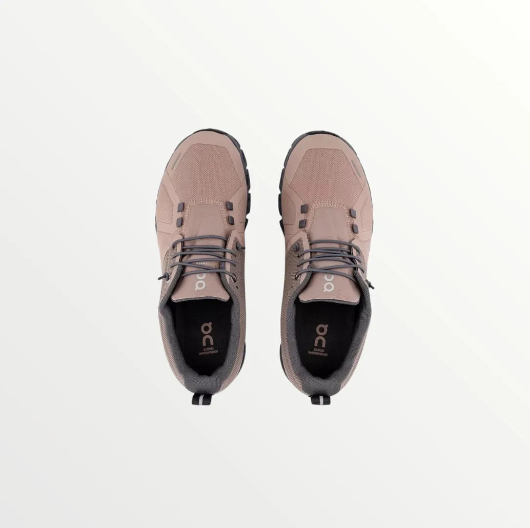 on cloud in pink sneaker